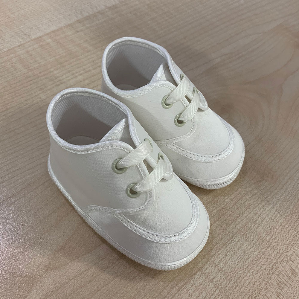 Scarpines de la ligne vêtements enfant Ambarabà, en matériaux très doux et avec un travail artisa...