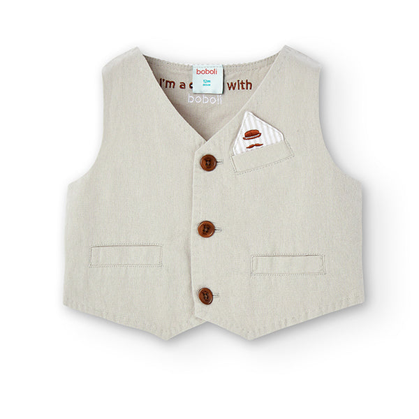Rendi unico il look dei tuoi bambini con questo gilet elegante beige, perfetto per occasioni spec...