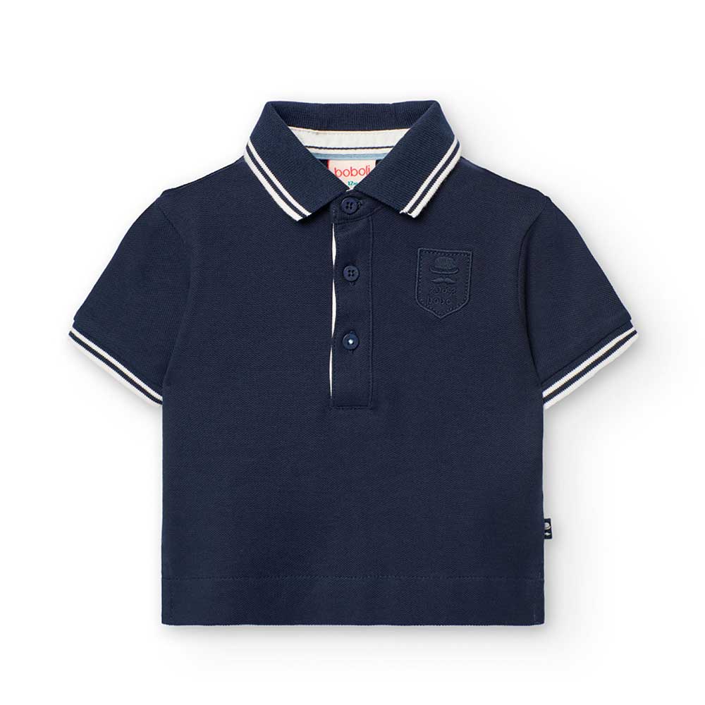 Polo in Uni-Farbe aus der Kinderbekleidungslinie Boboli, mit kontrastfarbenen Details an den Ränd...