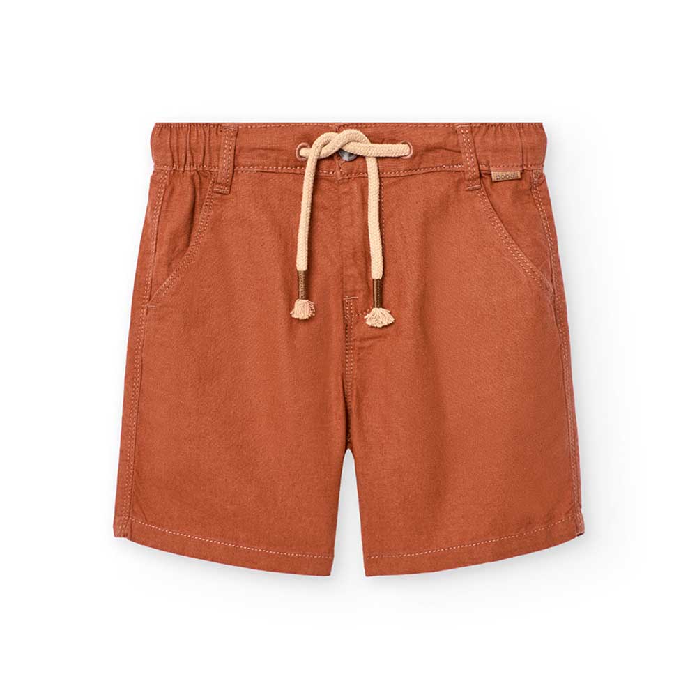 Bermuda della Linea Abbigliamento Bambino Boboli, con elastico in vita e laccetti sul davanti.

C...