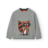 Maglione grigio con disegno di un procione colorato sulla parte anteriore.