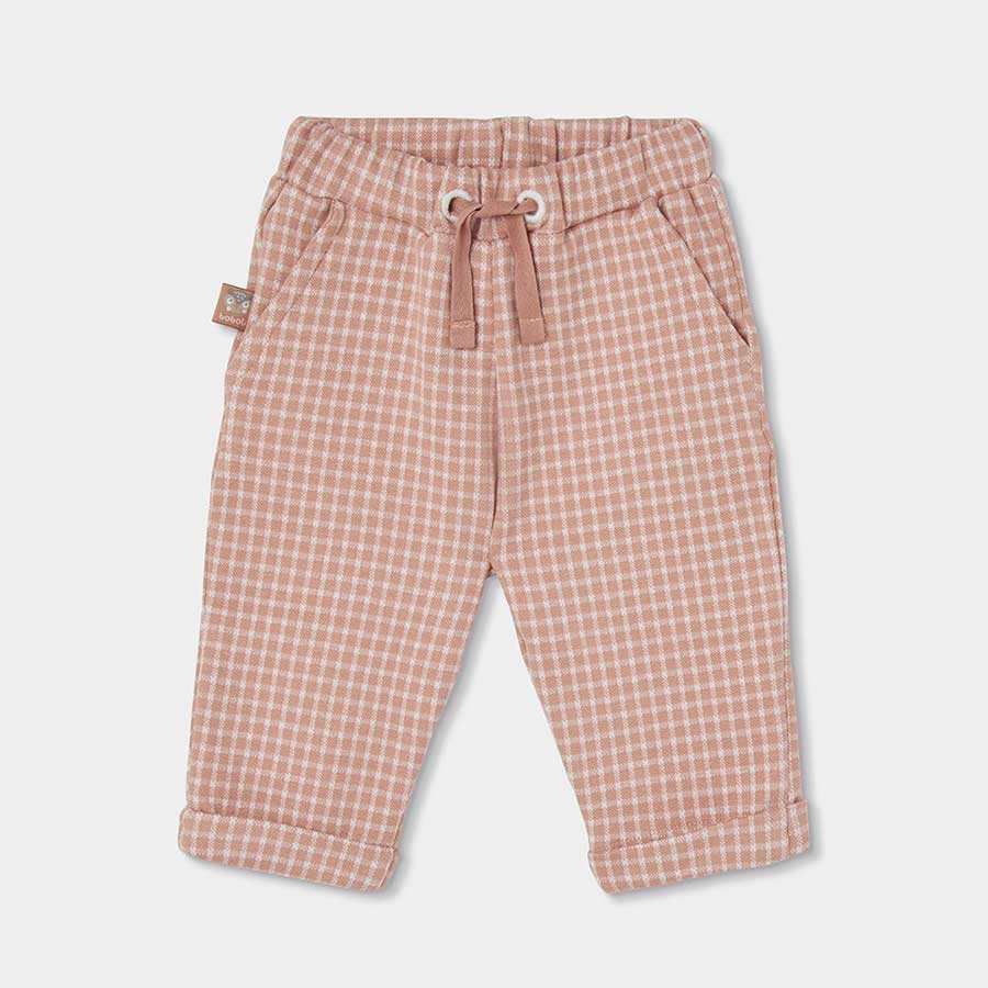 Questi pantaloni a quadri sono perfetti per i primi mesi del tuo bambino, ideali per mantenere ca...