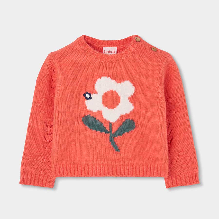 Avvolgi la tua piccola in un abbraccio di colore e dolcezza con questo maglione decorato con un g...