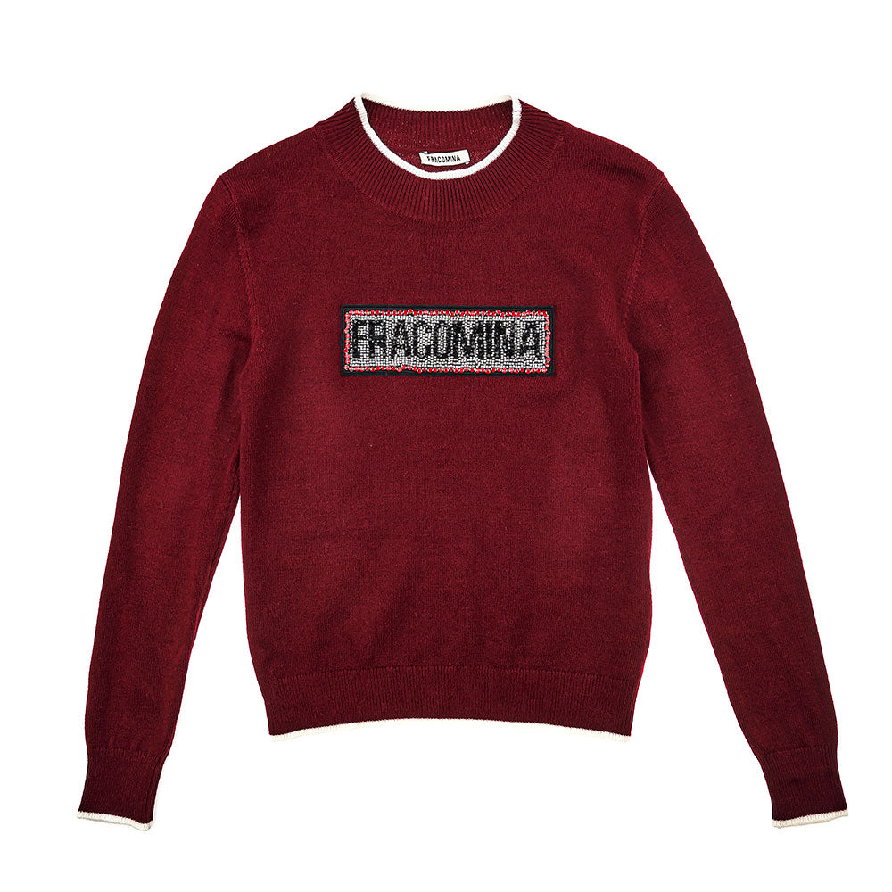 
  Pull della Linea Abbigliamento Bambina Fracomina, con bordini in contrasto di colore
  ed appl...