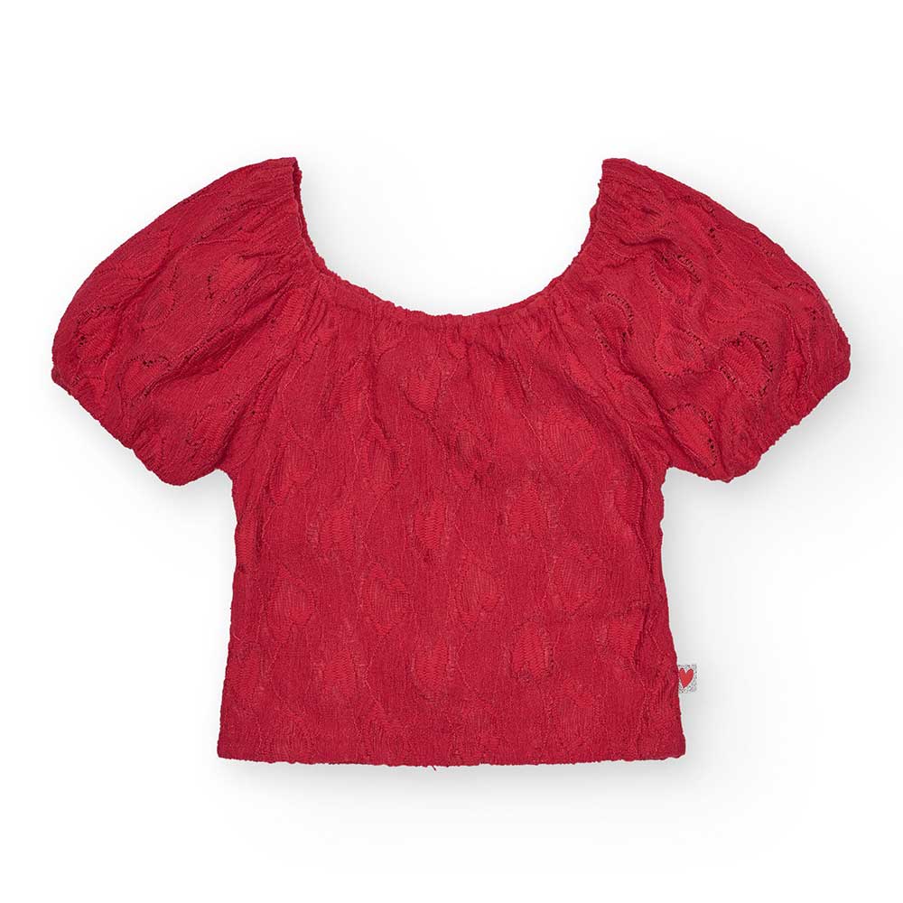 Top from the Nath Kids Girls' Clothing Line, with puffed straps. Solid color in perforated fabric...