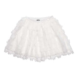 Gonna corta bianca con applicazioni floreali per bambina.