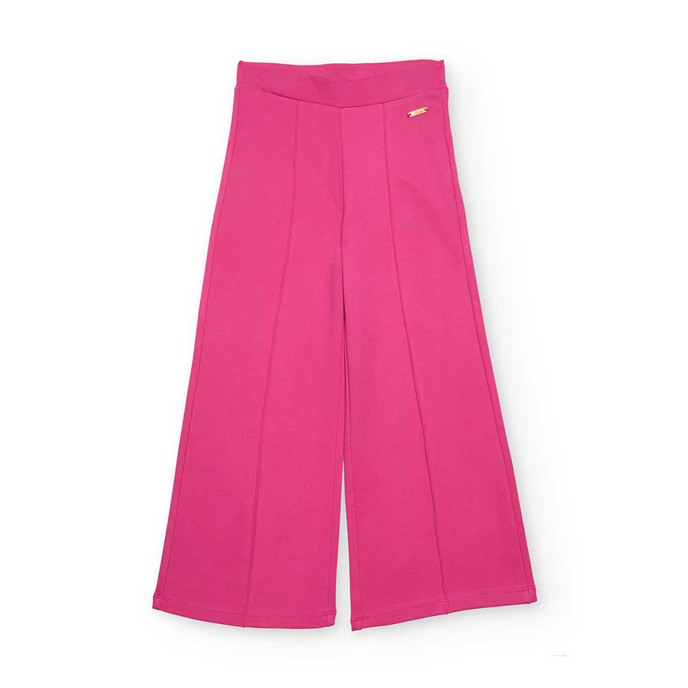 Scopri il meraviglioso pantalone largo della collezione Nath Kids, pensato per le piccole esplora...