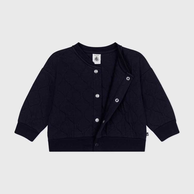 
Cardigan della Linea Abbigliamento Bambino Petit Bateau in tubique trapuntato, un tessuto morbid...