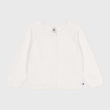 Cardigan bianco per bambina con bottoni e scollo arrotondato.