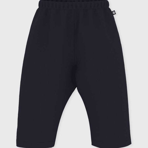 Pantaloncino in velluto a coste di colore blu scuro per bambini.