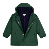 Giacca impermeabile verde con interno bicolore e cappuccio per bambini.