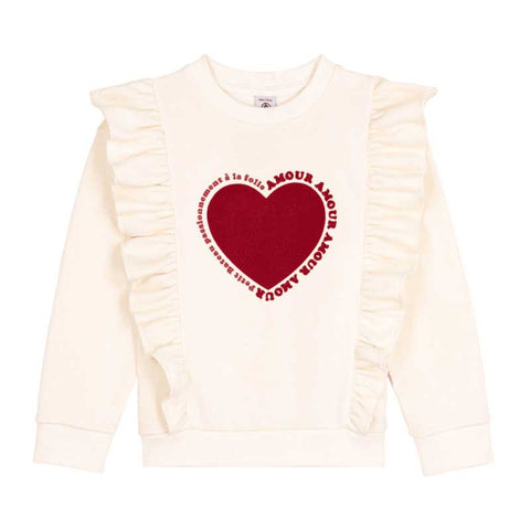 Felpa bianca con ruffles e cuore rosso.