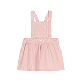 Abito smanicato con gonna arricciata per bambina, di colore rosa, con spalline incrociate.