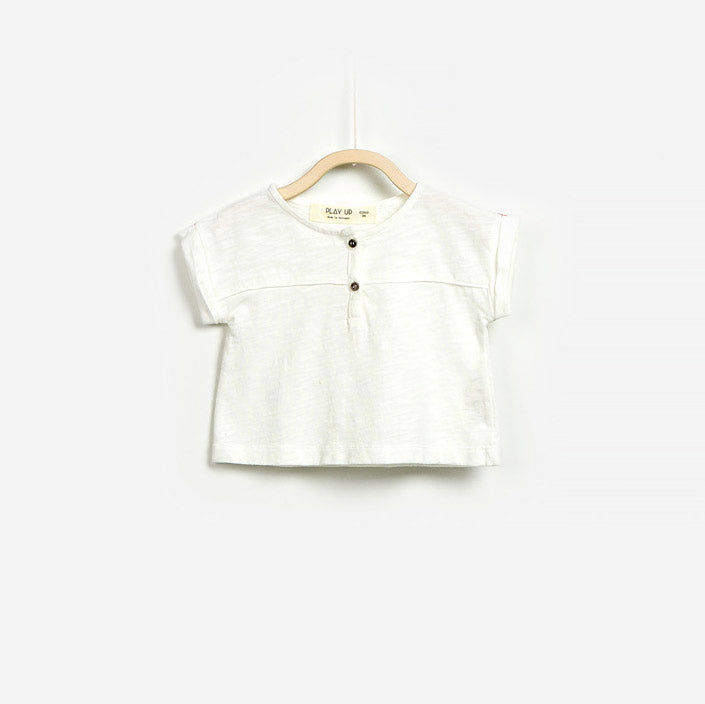 T-shirt della linea abbigliamento bambina Play Up in cotone fiammato, con bottoncini sul davanti....
