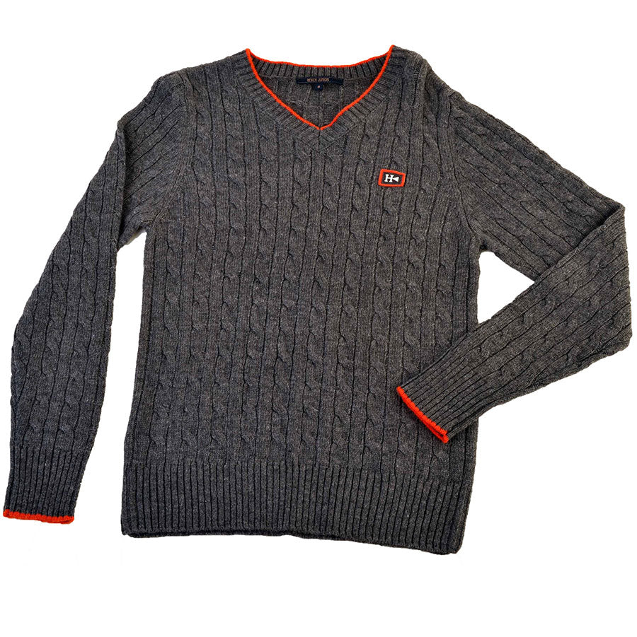 Maglione della linea abbigliamento bambino Silvian Heach Kids con tessitura a trecce, scollo a v ...