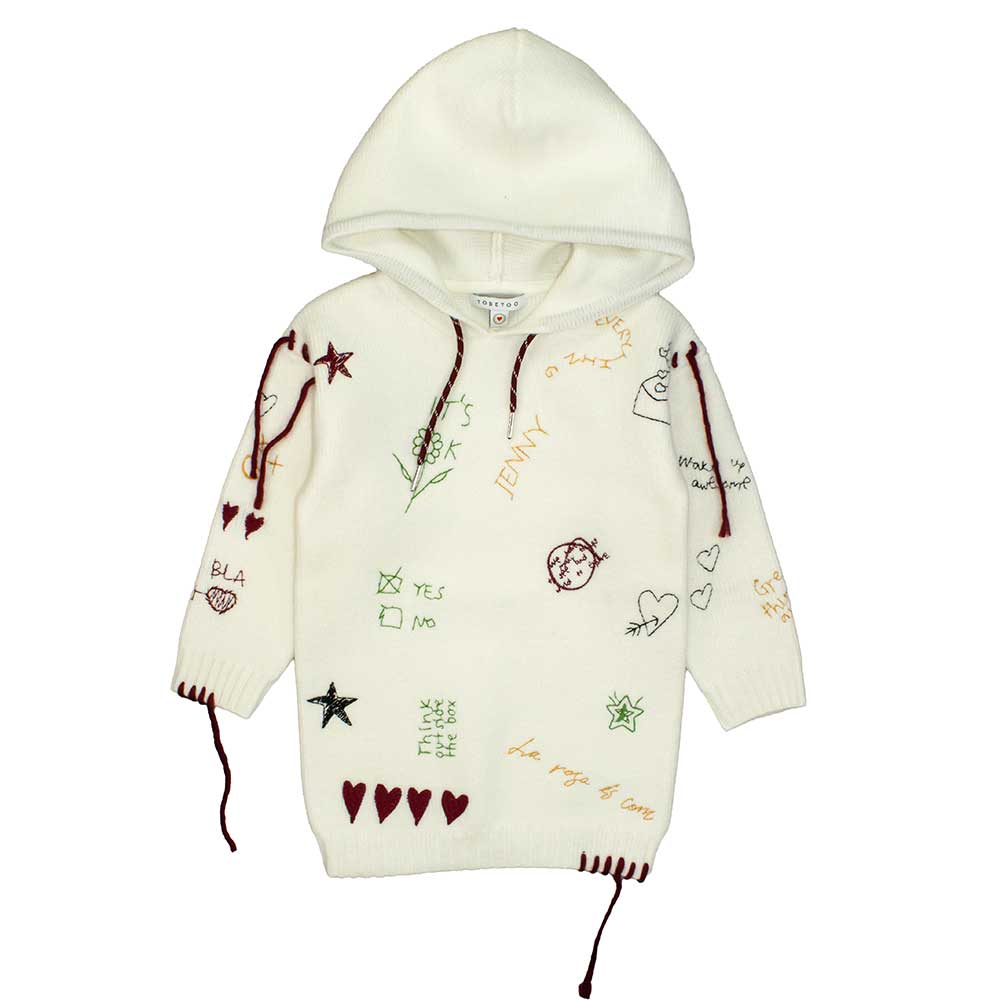 Avvolgi la tua bambina in un caldo e originale vestito maglia con cappuccio, perfetto per le gior...