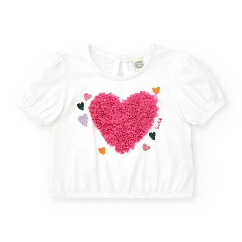 Maglietta della Linea Abbigliamento Tuc Tuc Bambina, con applicazione di piccoli petali sul davan...