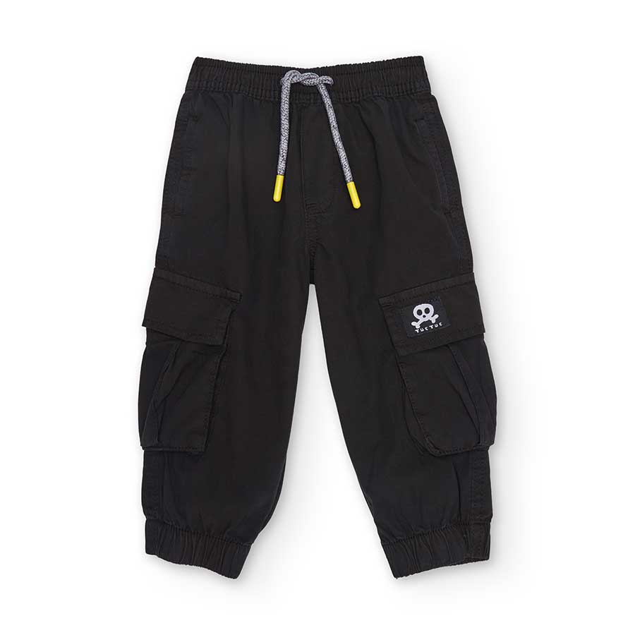 Pantalon long de la ligne de vêtements pour enfants Tuc Tc, avec élastique au bas et cordon à la ...