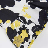 TOP CON BRETELLE FIORI
