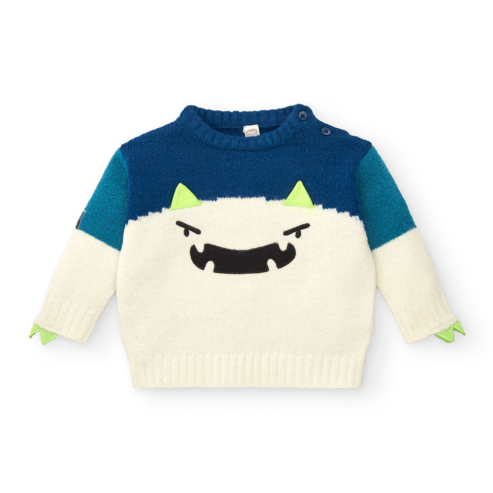 Sweater from the Tuc Tuc Children's Clothing Line, with monster-shaped embroidery on the front. 
...