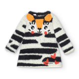 Abito in maglia per bambina con design a zebre e dettagli ricamati.
