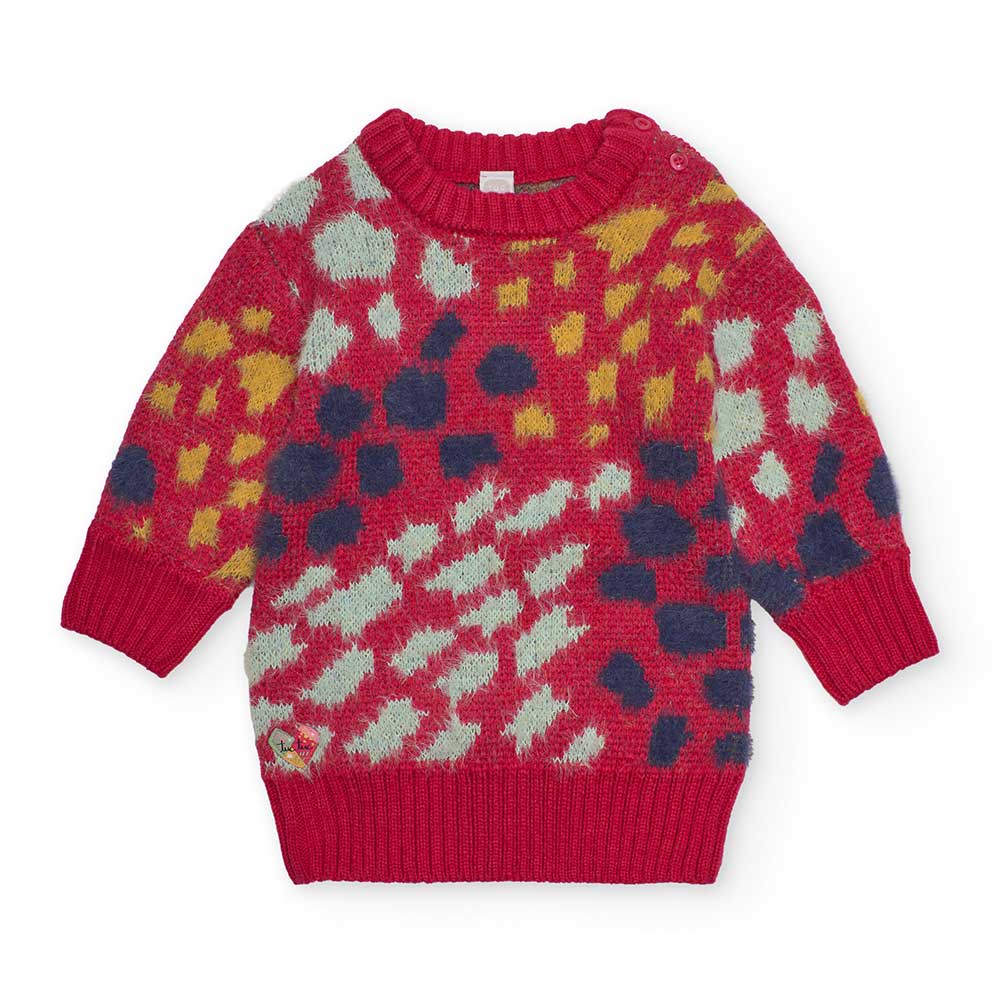 
Kleid aus der Kinderbekleidungslinie tuc Tuc, aus Strick mit leuchtenden Farben und Maxistrickmu...