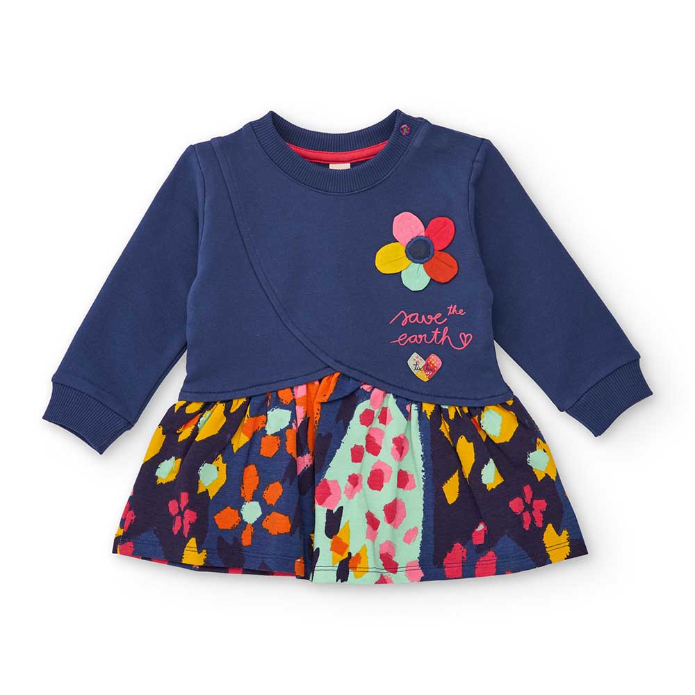 Robe de la ligne Vêtements Fille Tuc Tuc, avec une large jupe à motifs et un haut uni.
Compositio...