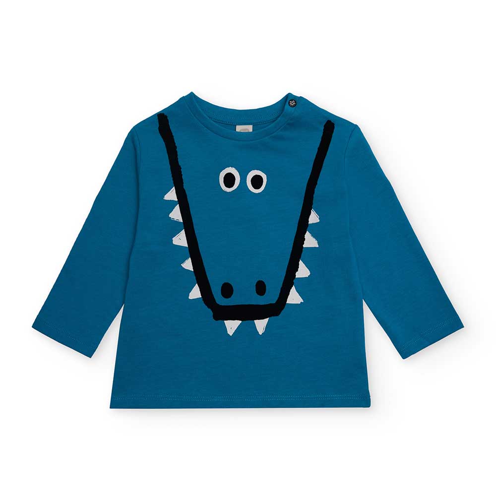 T-shirt from the Tuc Tuc Children's Clothing Line, with a monster design on the front on a light ...