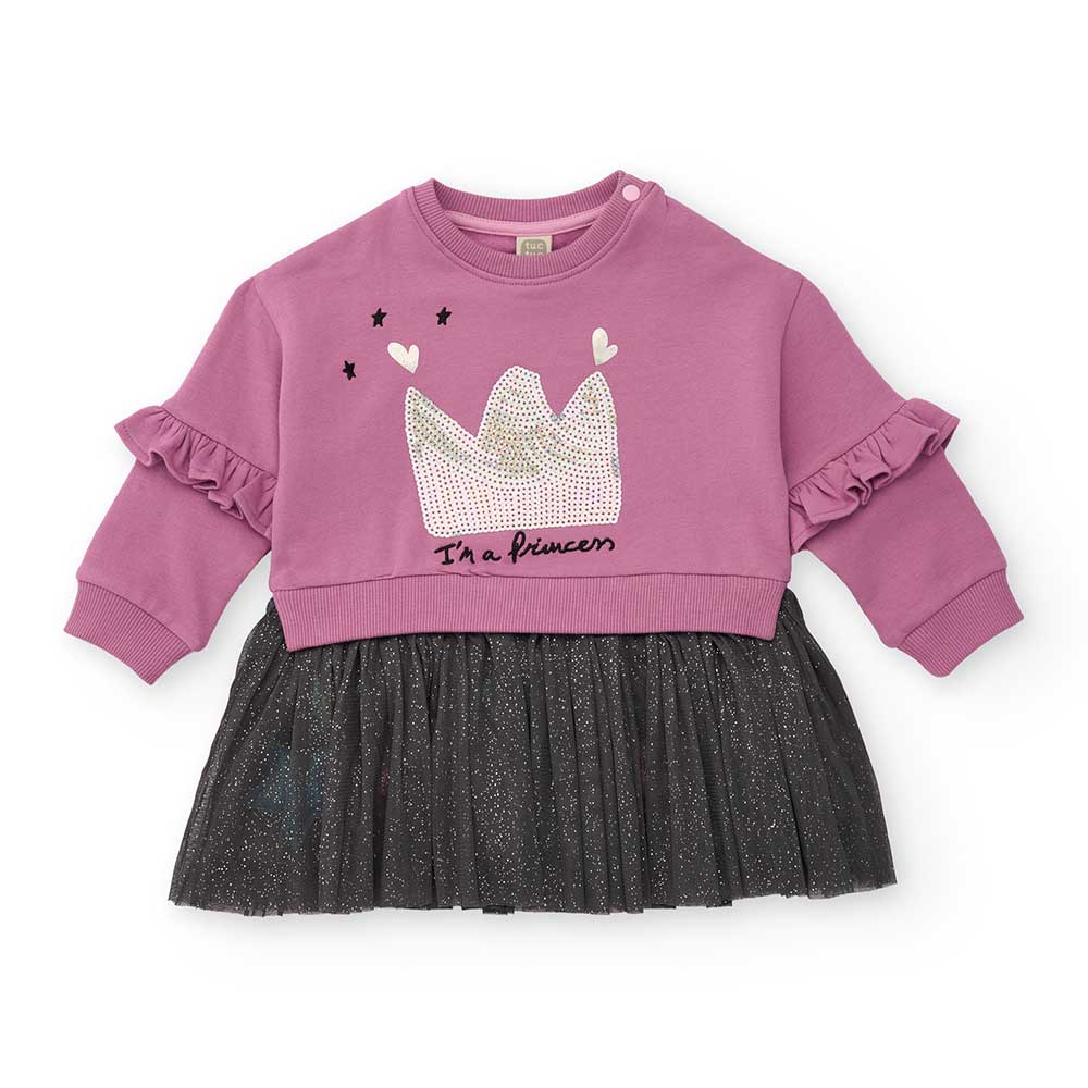 Questo vestito unisce la comodità di una morbida felpa alla magia di una gonna in tulle glitterat...