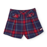 Pantalone corto a quadri blu e rosso con bottoni decorativi a forma di coccinella