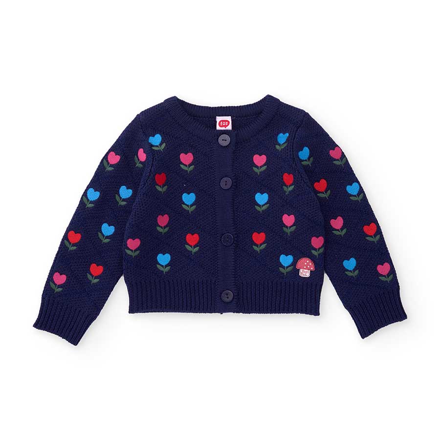 Avvolgi la tua bambina con questo dolce cardigan decorato con piccoli fiorellini colorati, perfet...